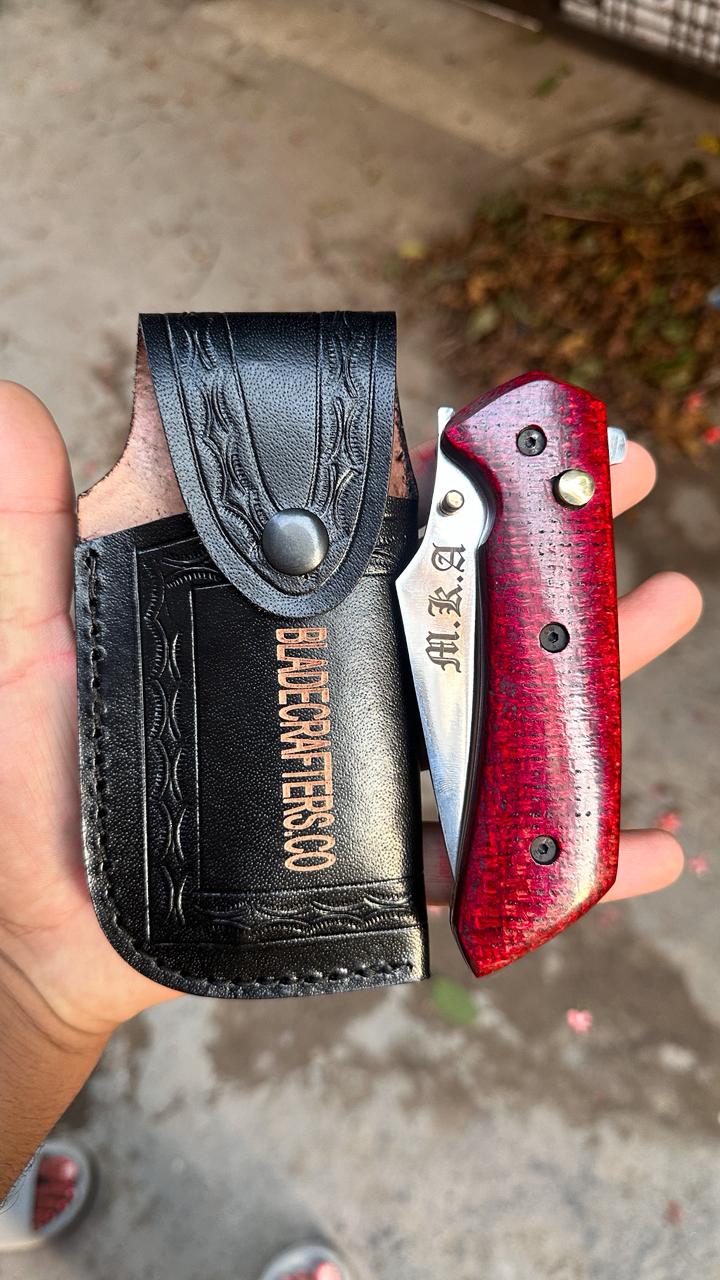 Huker - Handmade high carbon steel button lock folder