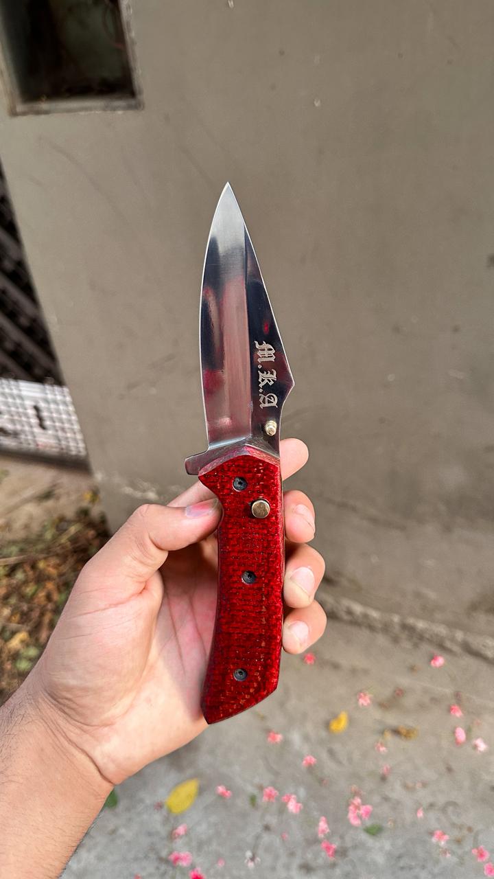 Huker - Handmade high carbon steel button lock folder