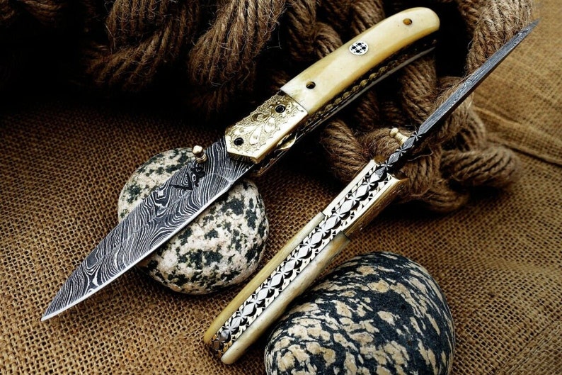 The DesertFang – Damascus Steel Folding Knife with Camel Bone Handle