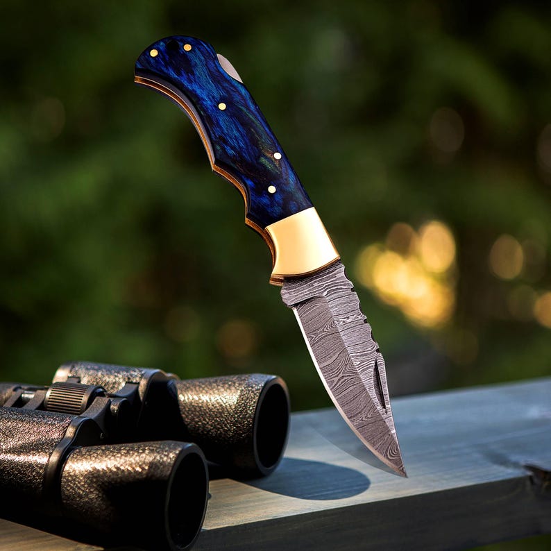 The BlueSpine – Handmade Damascus Folding Knife with Blue Pakka Wood Handle