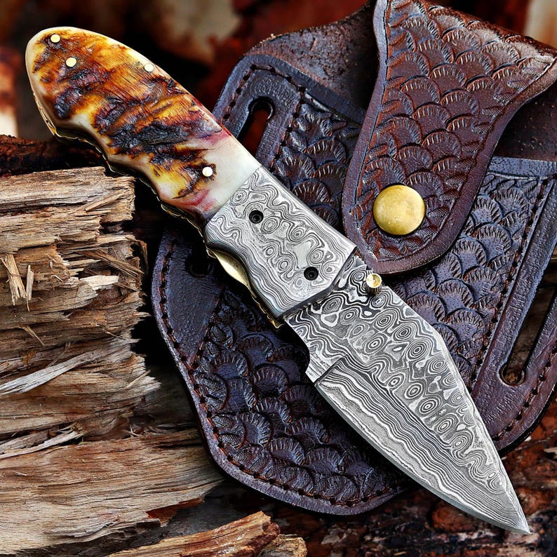 The HornBlade – Handmade Damascus Folding Knife with Bone & Ram Horn Handle