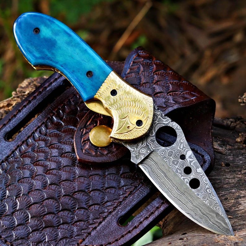 The HornBlade – Handmade Damascus Folding Knife with Bone & Ram Horn Handle
