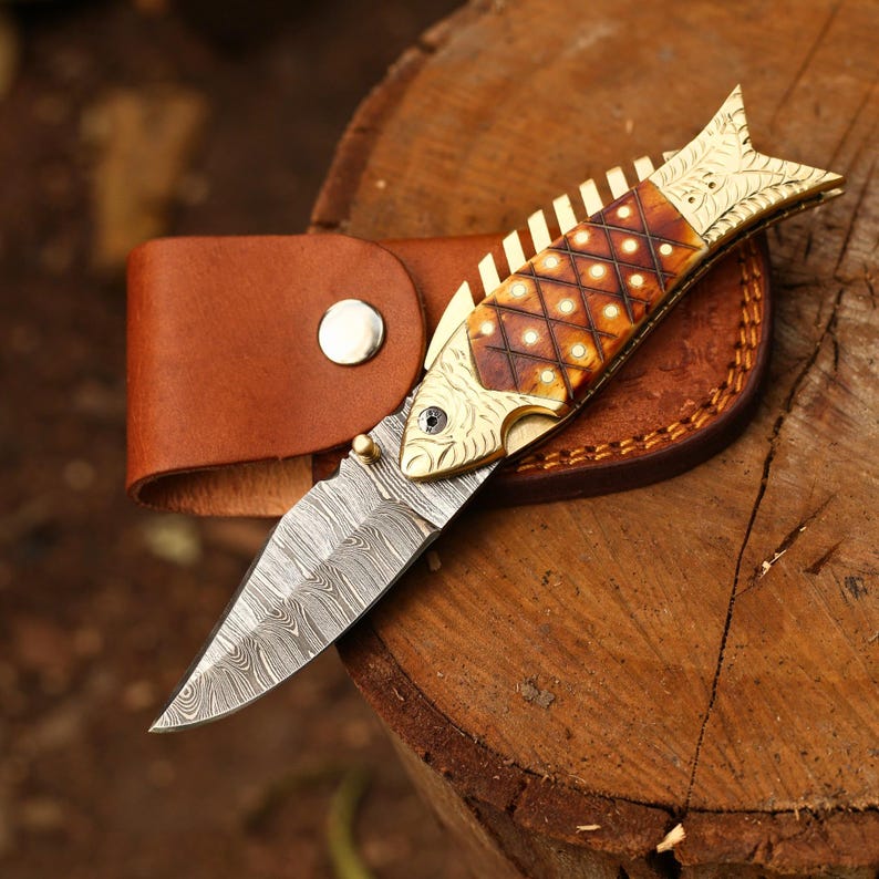 The FinBlade – Damascus Folding Knife with Fish Bone Handle