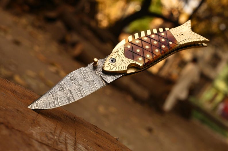 The FinBlade – Damascus Folding Knife with Fish Bone Handle
