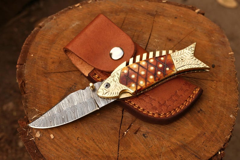 The FinBlade – Damascus Folding Knife with Fish Bone Handle