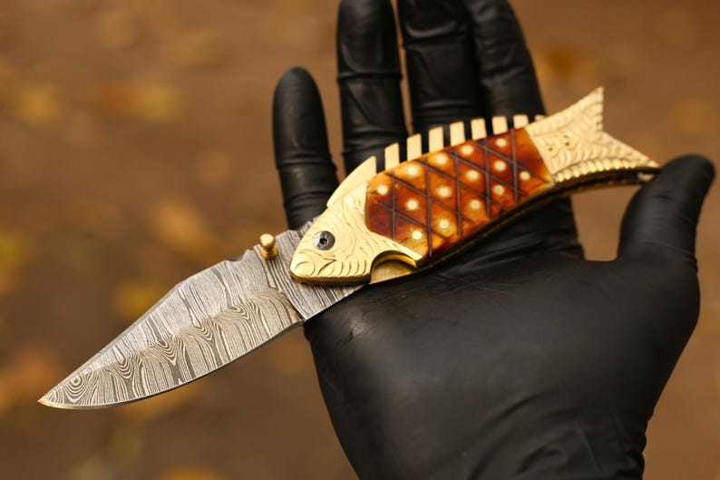 The FinBlade – Damascus Folding Knife with Fish Bone Handle