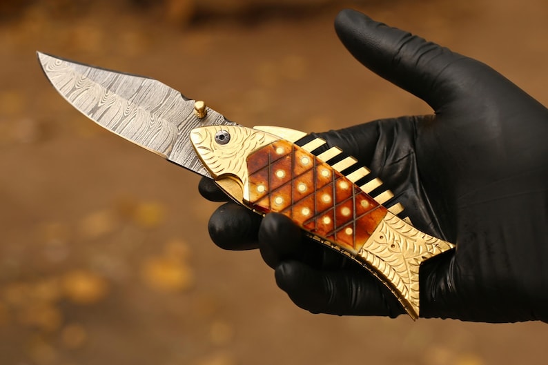 The FinBlade – Damascus Folding Knife with Fish Bone Handle